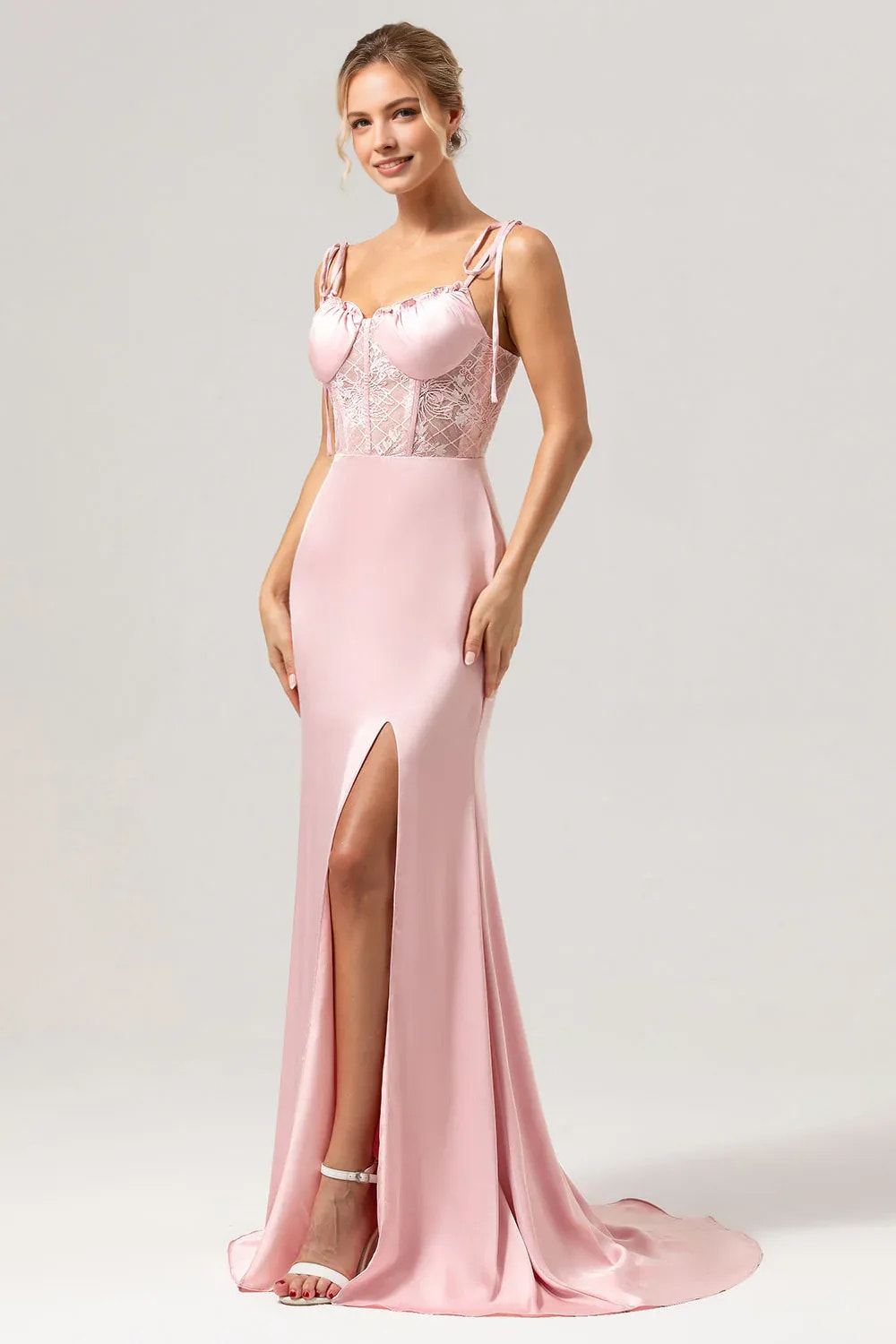 Sheath satin evening gown with V-neckline, lace corset bodice, tie shoulders, and front slit