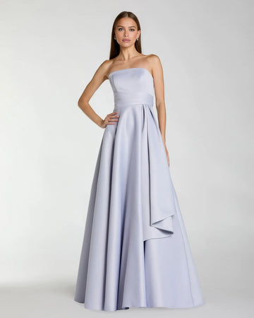 Strapless satin A-line bridesmaid gown with pleated waist, draped side detail, and floor-length formal skirt