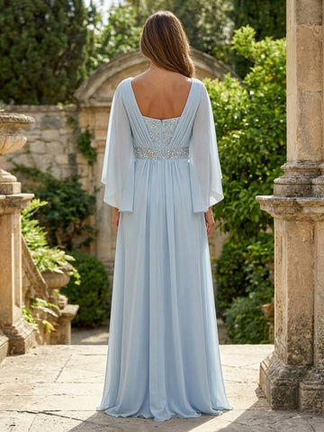 Model wearing vedress light blue a line chiffon wedding guest dress v back rhinestone detail outfit
