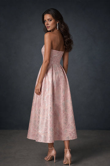 Blush pink floral Wedding Guest Dress with open back, center zipper, and A-line midi skirt