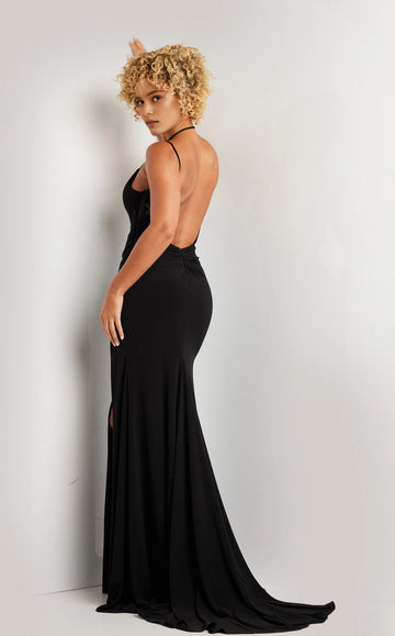 Side back view of a black floor-length prom dress showing its low open back and fitted skirt