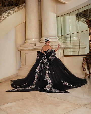 Back view Vedress black quinceanera gown corset lace-up back oversized big bow long train tulle dress