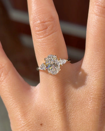 Gold Tone Oval Cluster Engagement Ring with Pear Side Stones