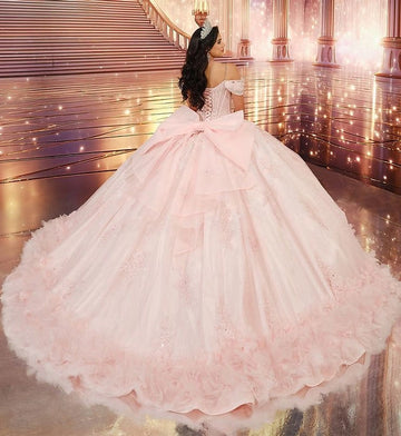 Vedress blush pink quinceañera gown lace-up corset back oversized satin big bow long 3D flower ruffle tulle train back view