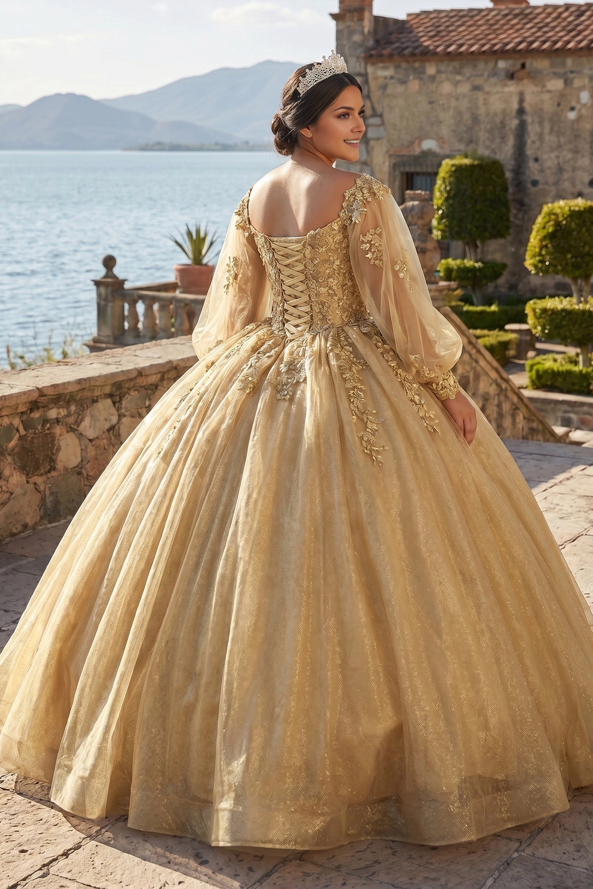 Vedress golden quinceanera ballgown back view, lace up corset back, floor length glitter tulle skirt decorated with 3D floral lace embroidery