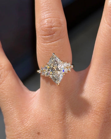 Gold Tone Marquise Cut Cluster Engagement Ring with Round Side Stones