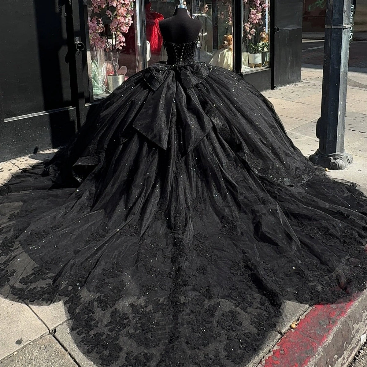 Vedress black quinceanera ball gown lace‑up corset back large bow long train dress back view