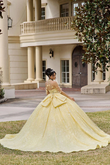 Vedress pale yellow quinceañera gown lace-up corset back oversized waist big bow, halter beaded chain straps, 3D flower long train back view