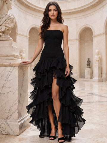 Vedress black strapless prom dress with a ruched bodice, tiered ruffle skirt, and high front slit.