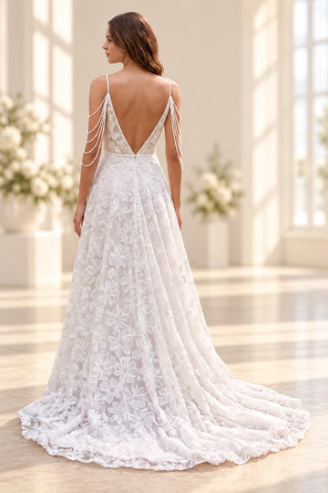Vedress daisy lace wedding dress with a deep V-back, sheer lace side panels, central skirt zipper and flowing train, back view
