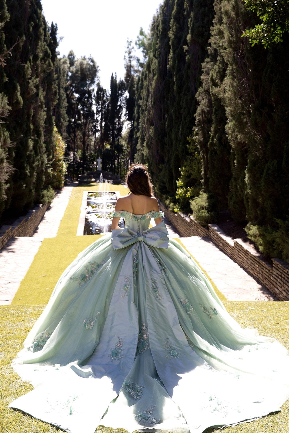 Vedress mint green quinceanera dress lace‑up corset back large satin bow cathedral‑train floral ballgown back view