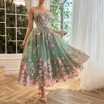 Vedress sage green floral embroidered strapless midi prom dress flowy skirt front view indoor garden background