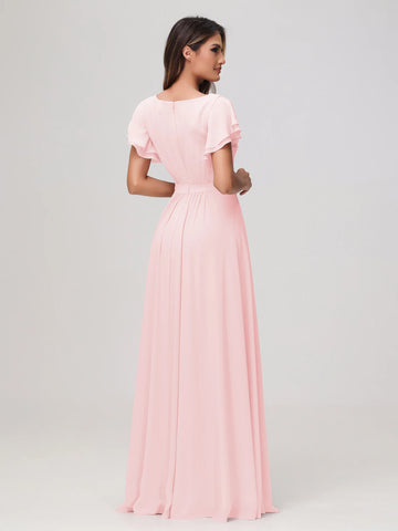 Back view of blushing pink chiffon bridesmaid dress with round neckline, ruffle sleeves, concealed zipper, pleated waist, and flowy A-line skirt by Vedress