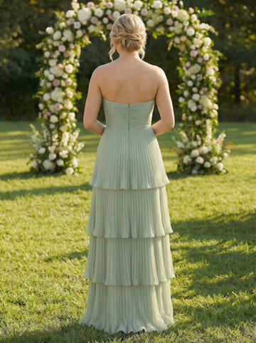 Back view sage green tiered maxi bridesmaid gown with strapless design and centre‑back invisible zipper