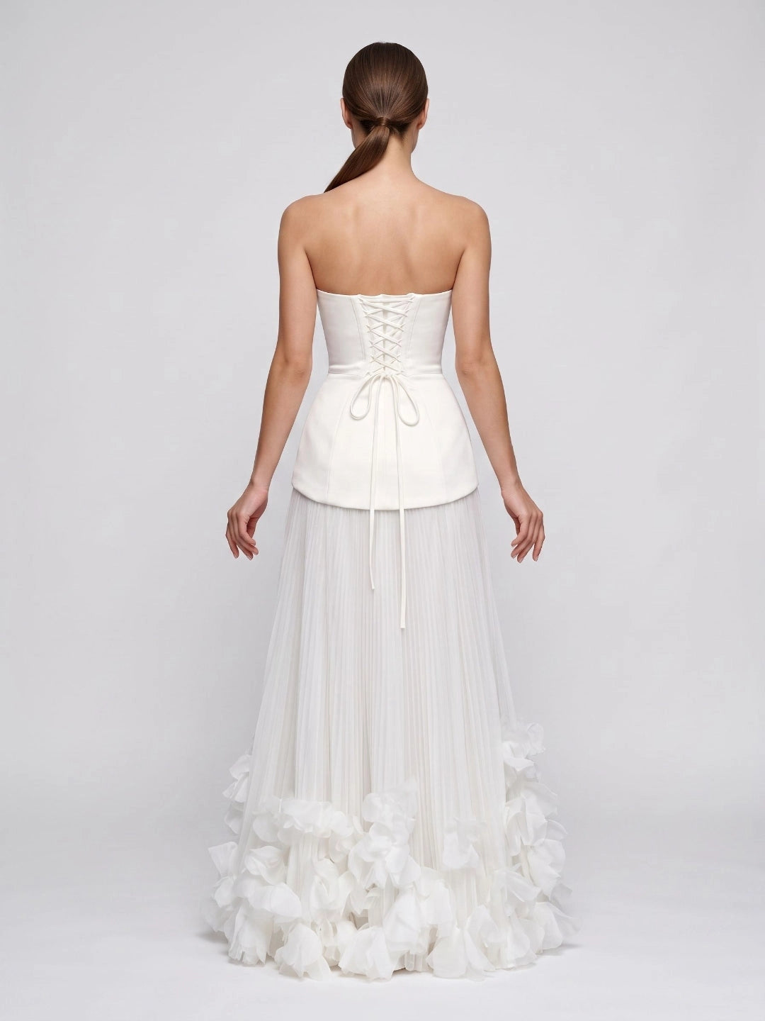 Ivory a‑line long wedding dress with strapless structured bodice pleated skirt 3D floral hem lace‑up back from Vedress