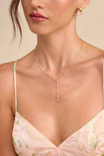 Gold-Tone Faux Pearl Lariat Necklace with Rhinestone Charm