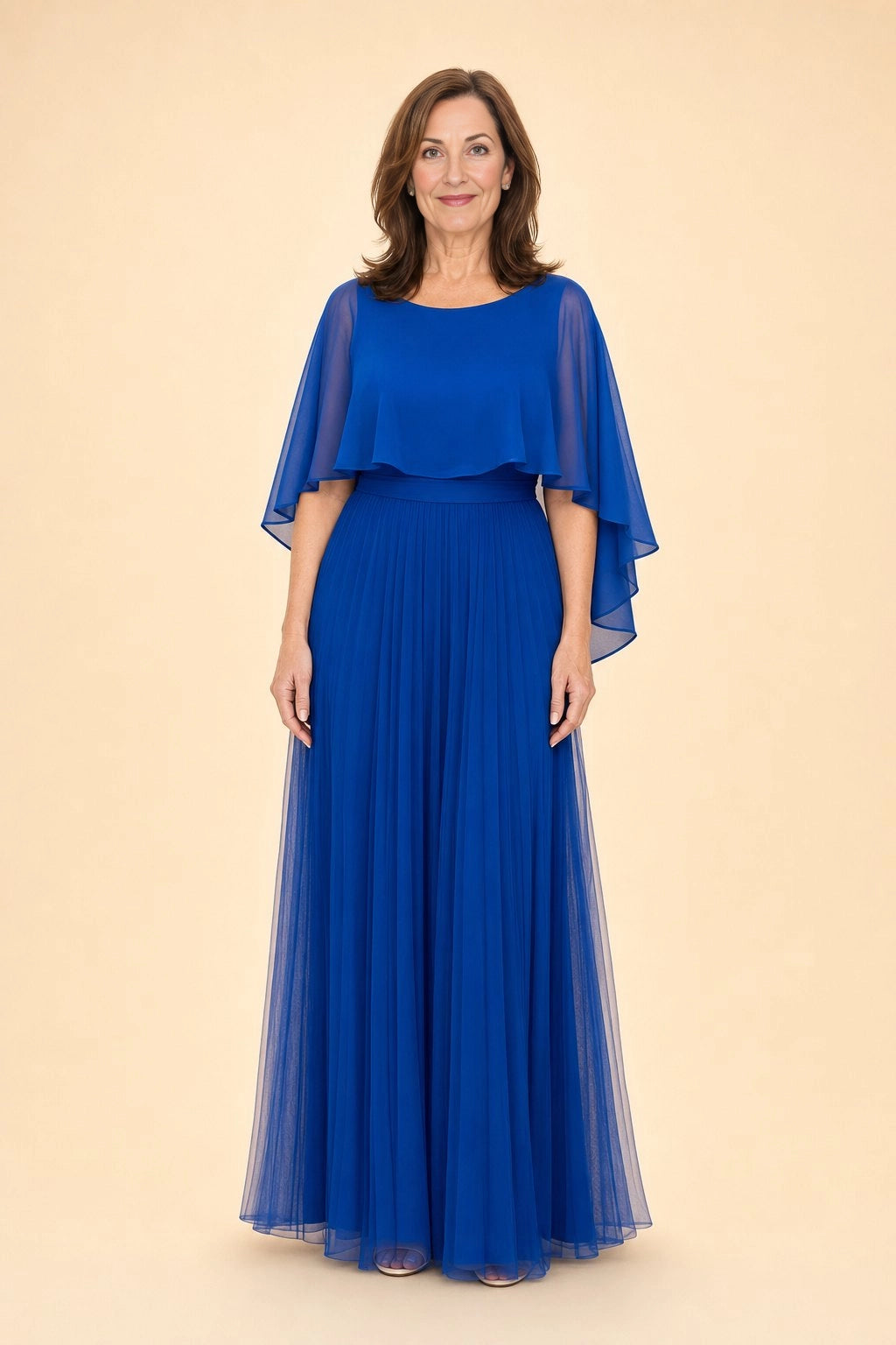 Vedress royal blue chiffon a‑line long mother of the bride dress,front view round neck,flowy cape overlay sleeves,high waist pleated skirt,beige studio background
