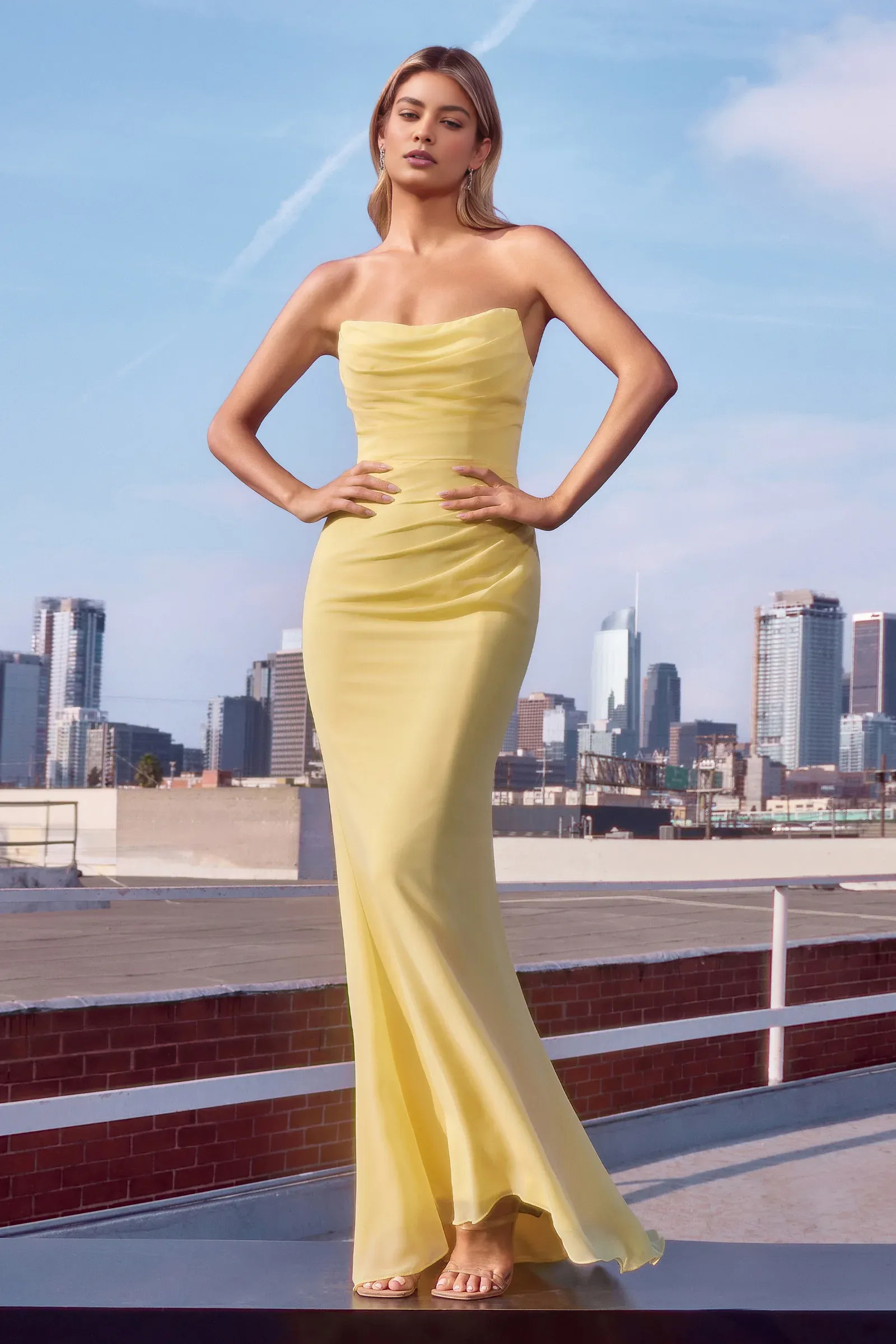 Mermaid strapless chiffon evening gown with cowl neckline, ruched bodice, fitted skirt, lace-up back, and floor-length hem