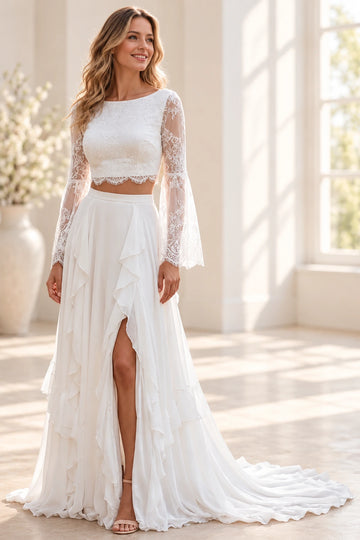 Vedress two-piece wedding dress with a bateau lace crop top, sheer bell sleeves and a ruffled chiffon skirt with a front slit, front view