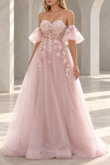 Front view of a Vedress blush pink A-line wedding dress with floral lace appliqués, a sweetheart neckline and off-the-shoulder puff sleeves.