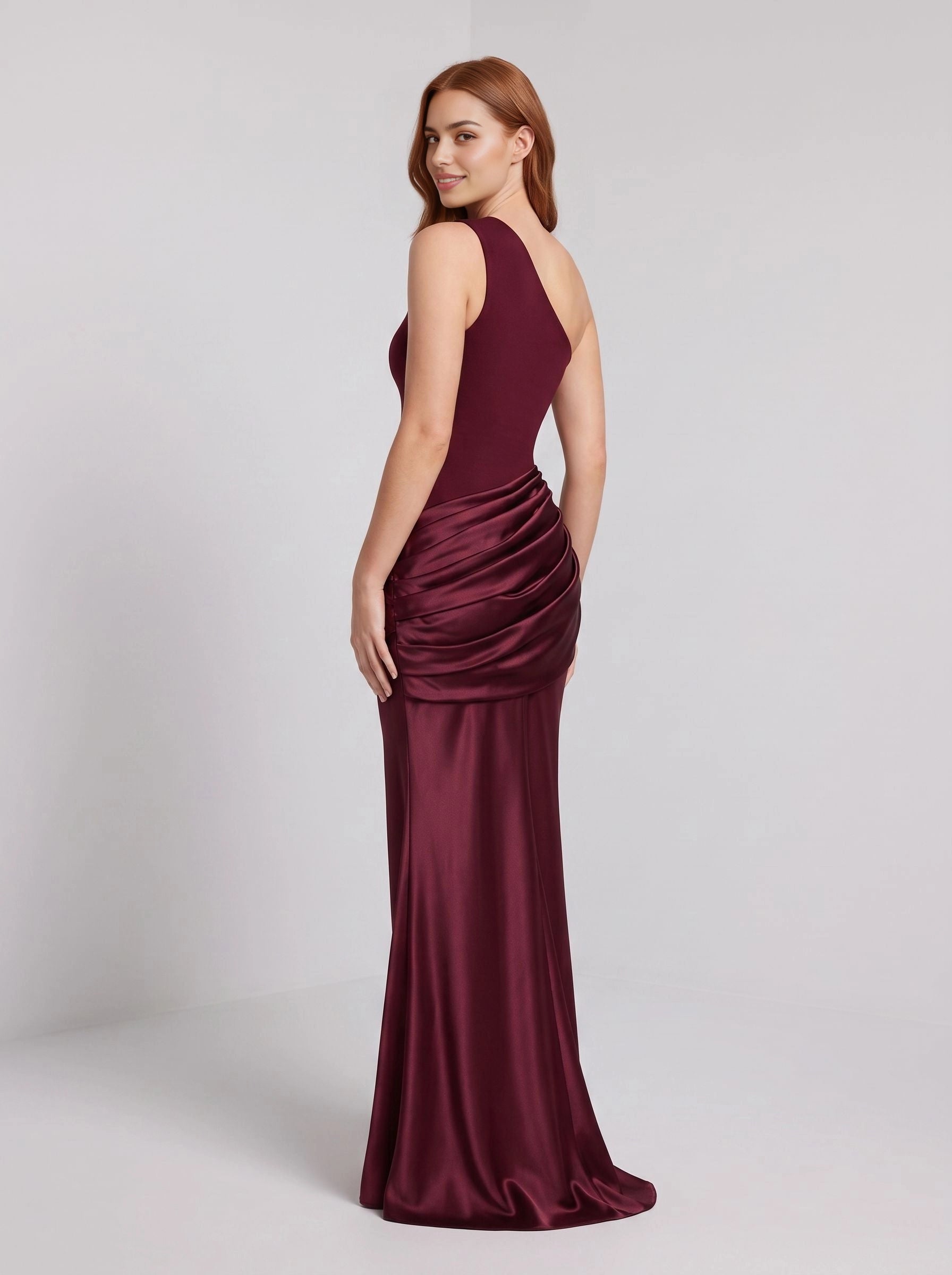 Burgundy mermaid long bridesmaid dress one‑shoulder neckline draped ruched waist glossy satin fabric sleek fitted back formal gown from Vedress