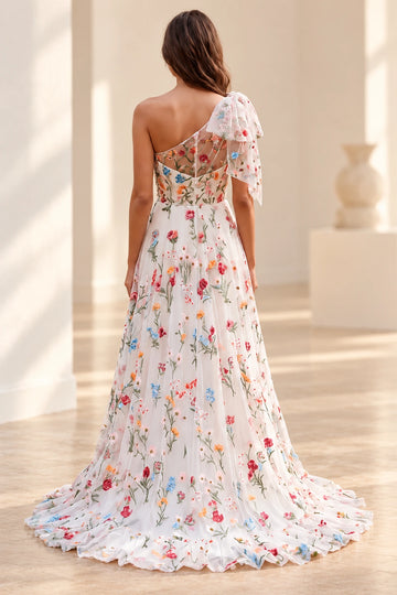 Vedress one-shoulder floral prom dress with a sheer embroidered back, central zipper, trailing bow ties and ruffled train, back view