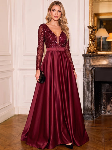 Vedress burgundy A-line evening dress with a sequin V-neck bodice, sheer long sleeves, and matching buckle belt.