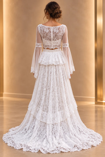 Vedress two-piece lace wedding dress with a sheer button back, scalloped crop top, tiered ruffle skirt and sweeping lace train, back view