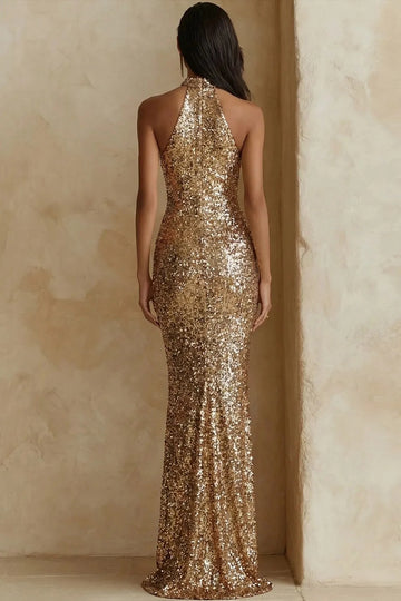 Back view of champagne gold sequin prom dress with a high halter back, exposed shoulders, fitted mermaid silhouette and floor-length hem.