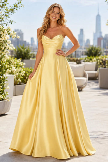 Daffodil yellow strapless sweetheart A-line prom dress with fitted bodice and floor length skirt front view