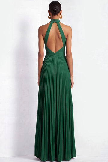 Back view of dark green bridesmaid dress featuring a geometric open back, wide halter straps, neck fastening, center-back zipper, and pleated A-line skirt.