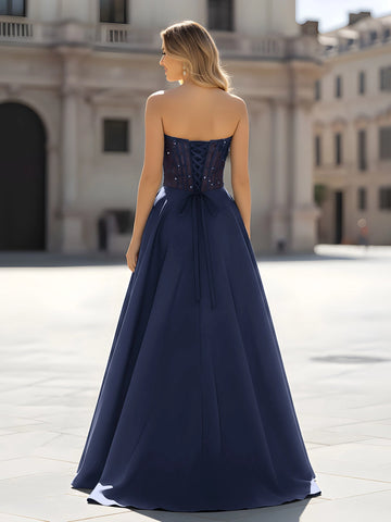 Dark navy floor-length prom dress with lace-up corset back and A-line skirt