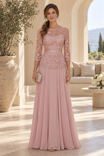 Dusty rose A-line mother of the bride dress with sheer illusion neckline, floral lace bodice, three-quarter sleeves, defined waist and flowing floor-length skirt