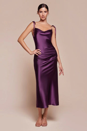 Eggplant satin-look midi bridesmaid dress with a draped cowl neckline, tie-shoulder spaghetti straps, and a fitted sheath silhouette by Vedress.