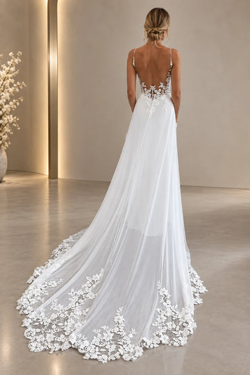 Back view of open-back lace wedding dress with spaghetti straps and floral sweeping train