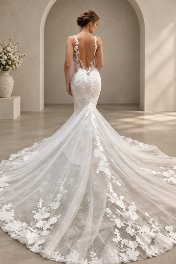 Back view of mermaid lace wedding dress with open back, covered buttons, and floral train