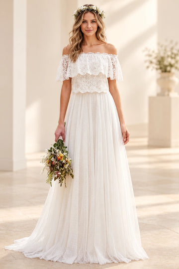 Vedress off-shoulder wedding dress with a scalloped lace bodice, flutter sleeves and a flowing dotted tulle A-line skirt, front view