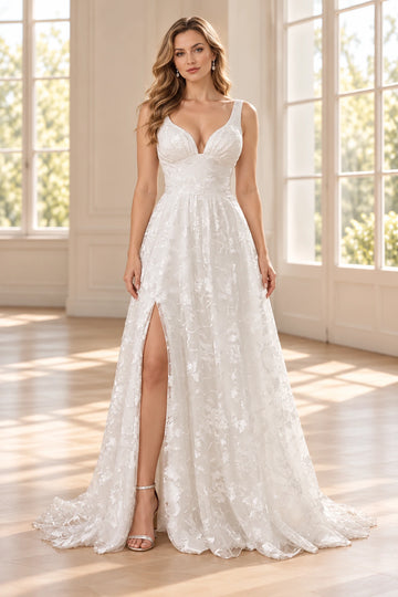Vedress floral lace A-line wedding dress with a plunging V-neckline, wide shoulder straps, a fitted waist and a high leg slit, front view.