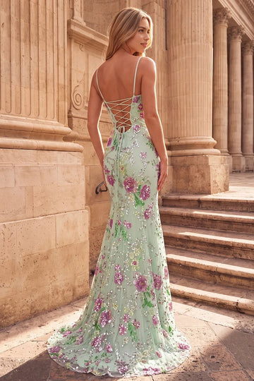 Back view of Vedress floral sequin mermaid prom dress with an open lace-up back, trailing waist ties and a sweep train.