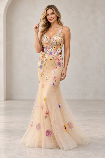Front view of a Vedress champagne floral tulle mermaid wedding guest dress with colorful appliqués, a plunging V-neck and slender straps.