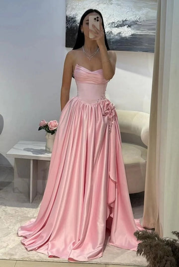 Pink strapless sweetheart satin A-line floor length prom dress with floral waist detail by Vedress