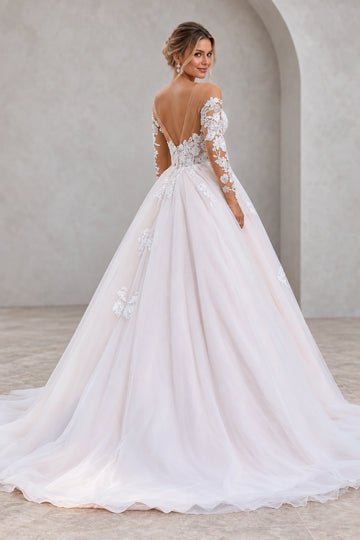 Back view of tulle wedding dress with deep V illusion back and floral lace sleeves