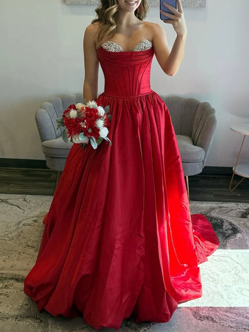 Red A-line sweetheart strapless prom dress with crystal embellished corset bodice