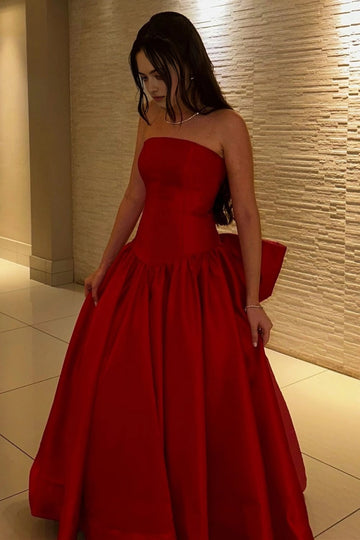 Red strapless ball gown prom dress with fitted bodice and full floor length skirt by Vedress