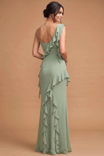 Back view of sage green bridesmaid dress featuring a low scoop back, one thin strap, cascading shoulder ruffles, fitted silhouette, and long ruffled skirt.