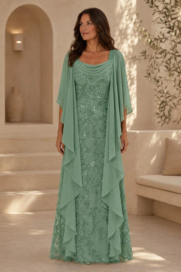Sage green sheath mother of the bride dress with a draped cowl neckline, sparkling botanical beadwork, flowing cape sleeves and floor-length skirt.