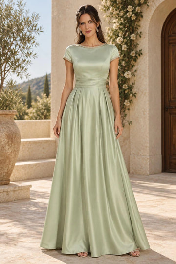 Sage green A-line mother of the bride dress with round neckline, embellished cap sleeves, ruched waistband and floor-length pleated satin-look skirt