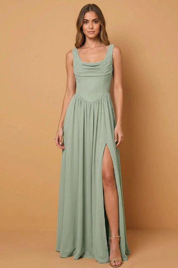 Sage green A-line bridesmaid dress featuring a draped cowl neckline, wide straps, V-shaped waist, thigh-high slit, and flowing floor-length skirt by Vedress.