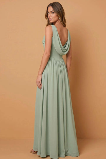 Back view of sage green bridesmaid dress with a deep draped cowl back, wide shoulder straps, fitted V-shaped waist, and flowing A-line maxi skirt.