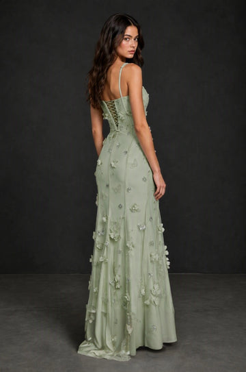 Sage green floor-length prom dress with floral appliqués and lace-up corset back